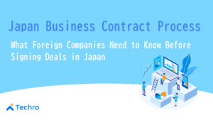 Blue banner with the title 'Japan Business Contract Process' and subtitle about foreign companies; isometric team around a laptop and charts; Techro logo bottom-left.